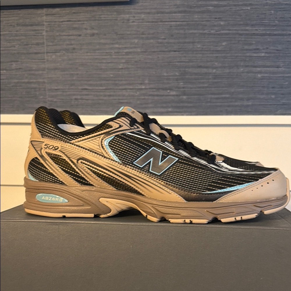 New Balance Men’s 509 Black and Tan Athletic Sneakers